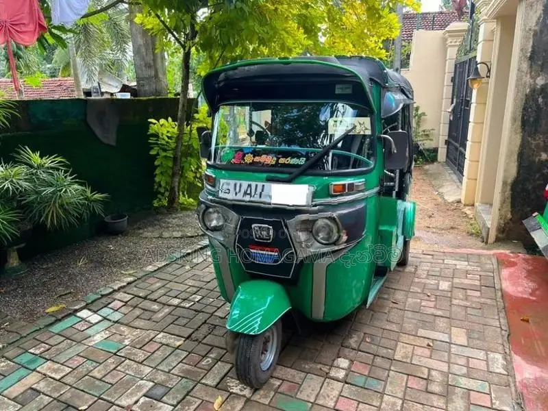 Bajaj RE 4 stroke 2014