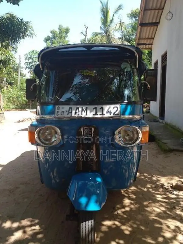 Bajaj RE 2014