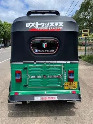 Bajaj RE 2014