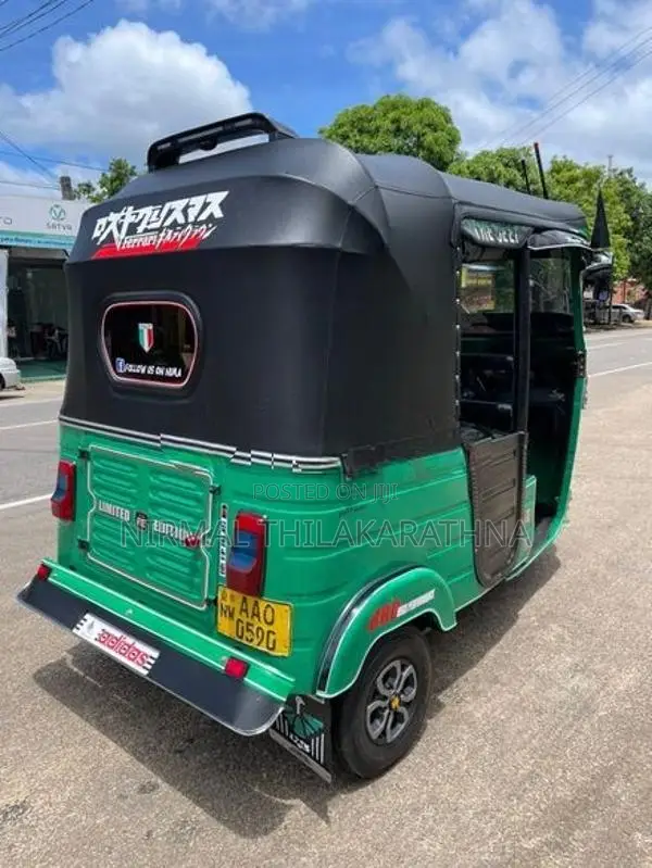 Bajaj RE 2014