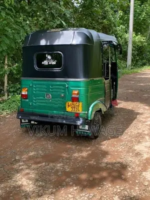 Bajaj RE 2013