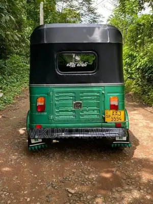 Bajaj RE 2013