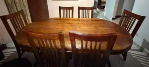 Selling a solid teak wood 6-seater dining table set.