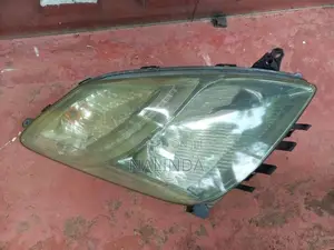 Prius 20 Genuine Right Side Headlight Complete with Auto Focus Unit