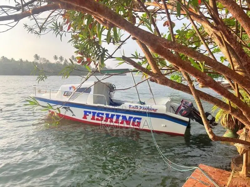 Fishing Boat with Two Outboard Motors