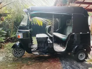 Bajaj RE 2013