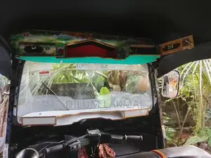 Bajaj RE 2013