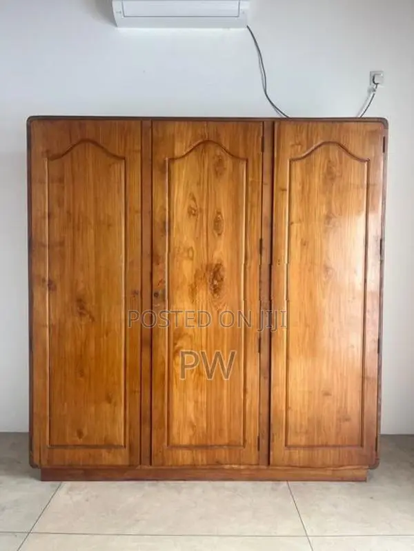 Three door teak wardrobe