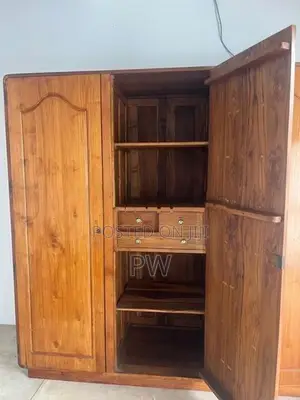 Three door teak wardrobe