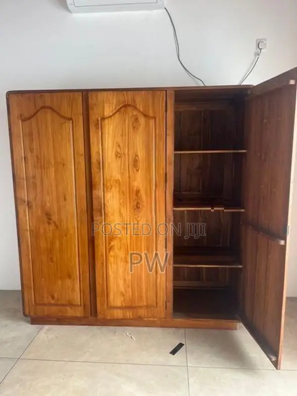 Three door teak wardrobe
