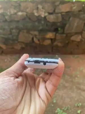 Liam Button Phone (Used)