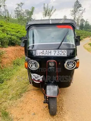 Bajaj RE 2014