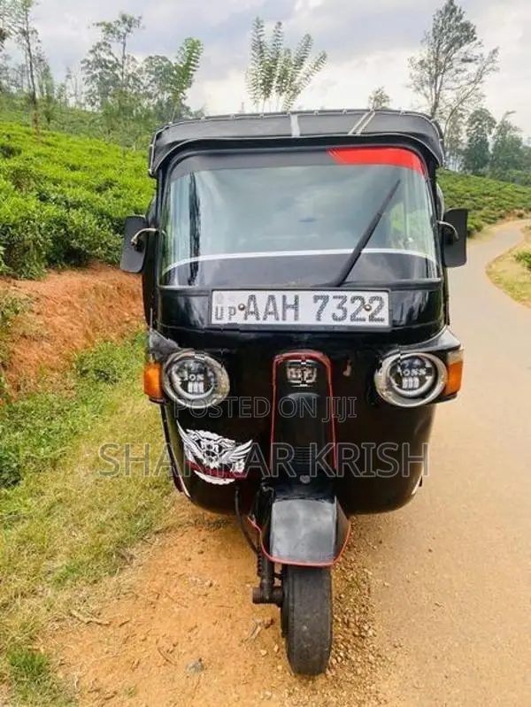 Bajaj RE 2014