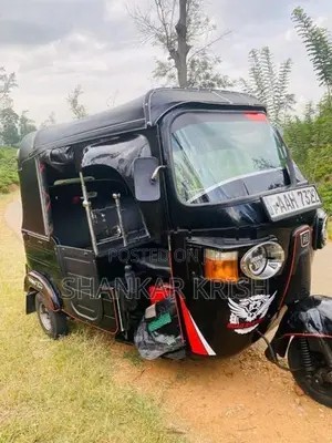 Bajaj RE 2014
