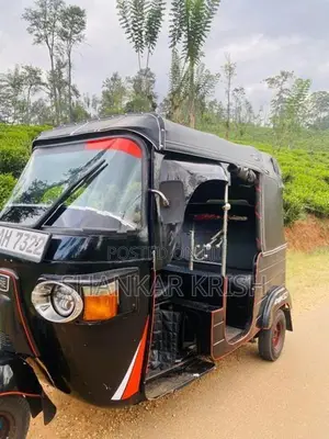 Bajaj RE 2014