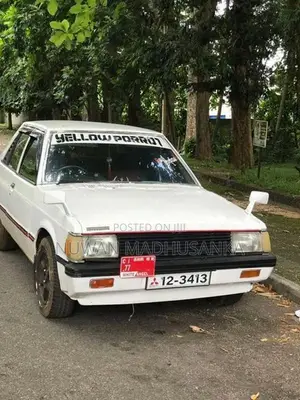 Mitsubishi Lancer White 1985