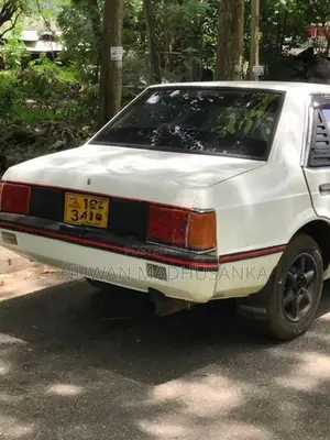 Mitsubishi Lancer White 1985