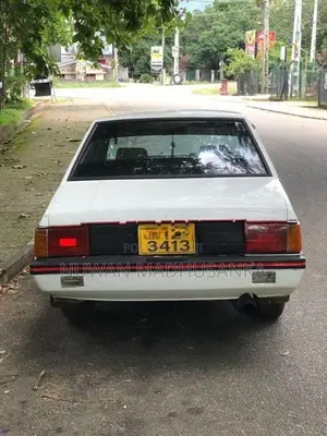 Mitsubishi Lancer White 1985