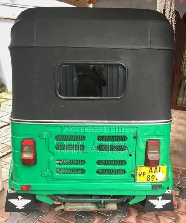 Bajaj RE 2013