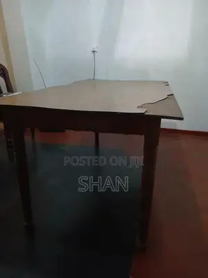 Teak dining table