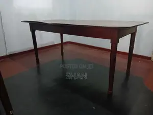 Teak dining table