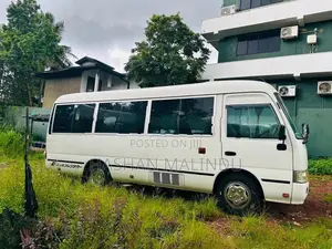 Toyota Coaster Hino 2013
