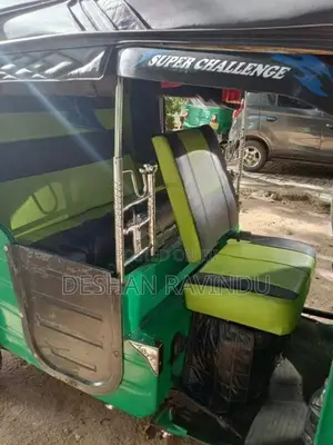 Bajaj RE 2013