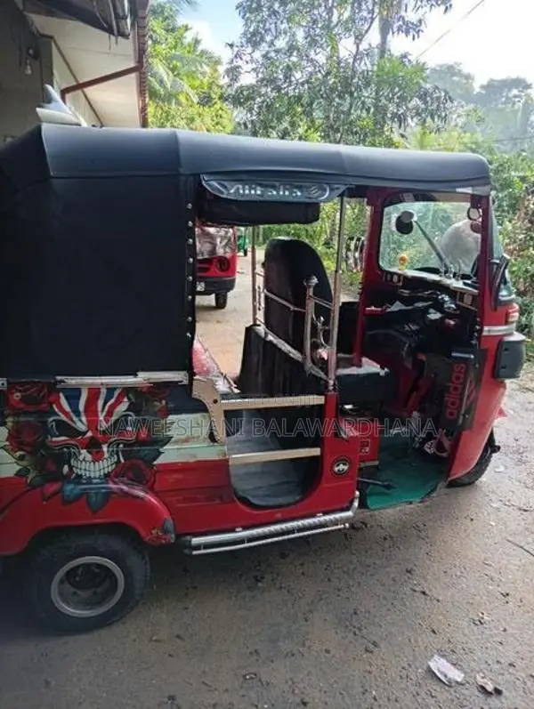 Bajaj RE 2014