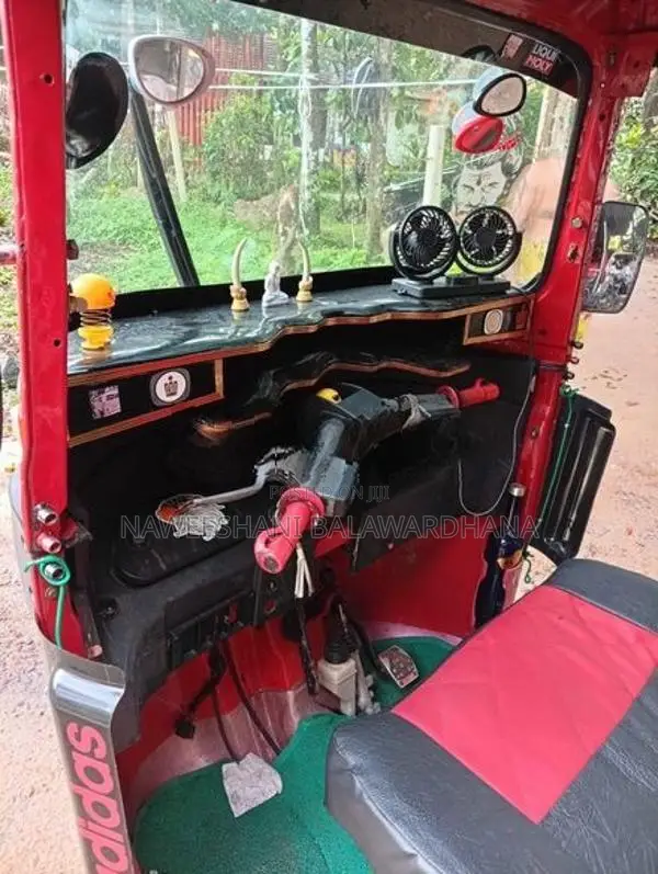 Bajaj RE 2014