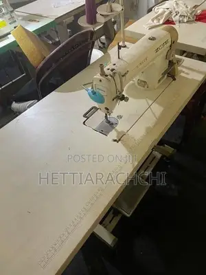 Zoje Sawing Machine