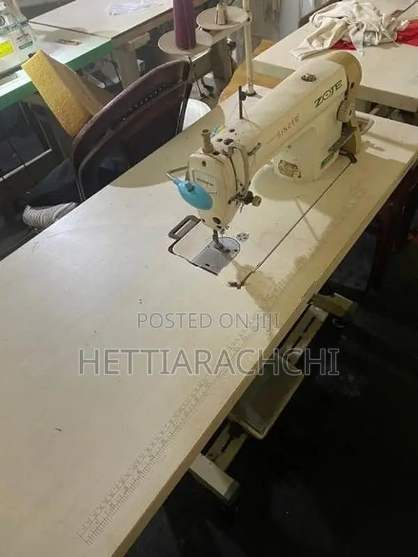 Zoje Sawing Machine