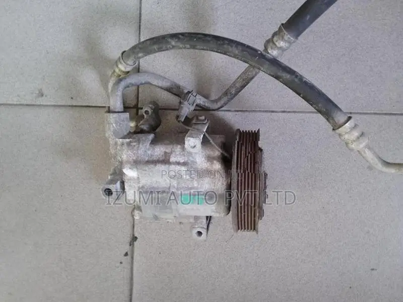 Nissan FB15 AC Compressor (New Shell)