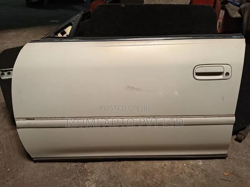 Toyota Crown Gx100 Four Door pannels with handles and weather stripes
