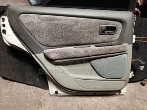 Toyota Crown Gx100 Four Door pannels with handles and weather stripes