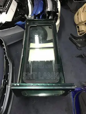 Genuine Land Rover Defender Puma 2014 quarter glass panel door