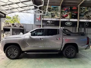 Mitsubishi Triton 2025 Hamer Electric Roll Shutter with Night Fury Bar