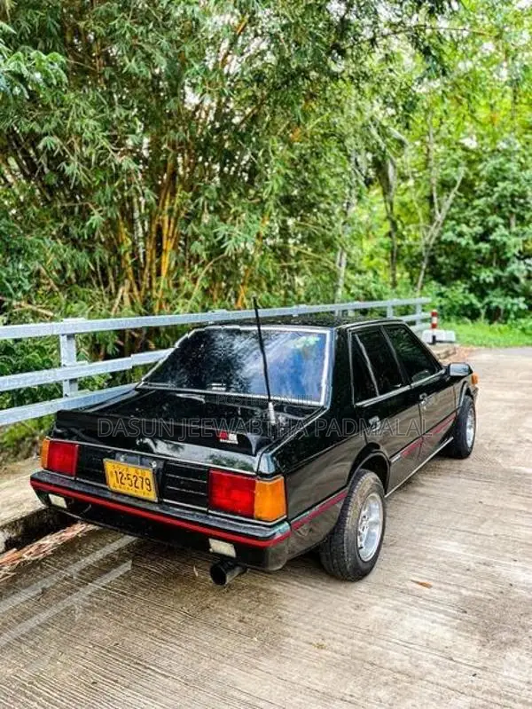 Mitsubishi Lancer box 1982