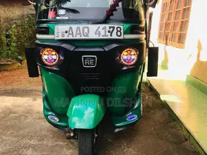 Bajaj RE 2014