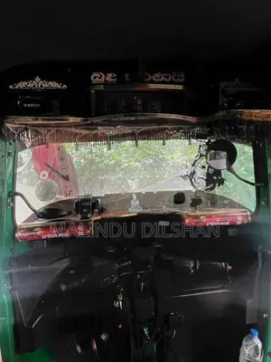 Bajaj RE 2014