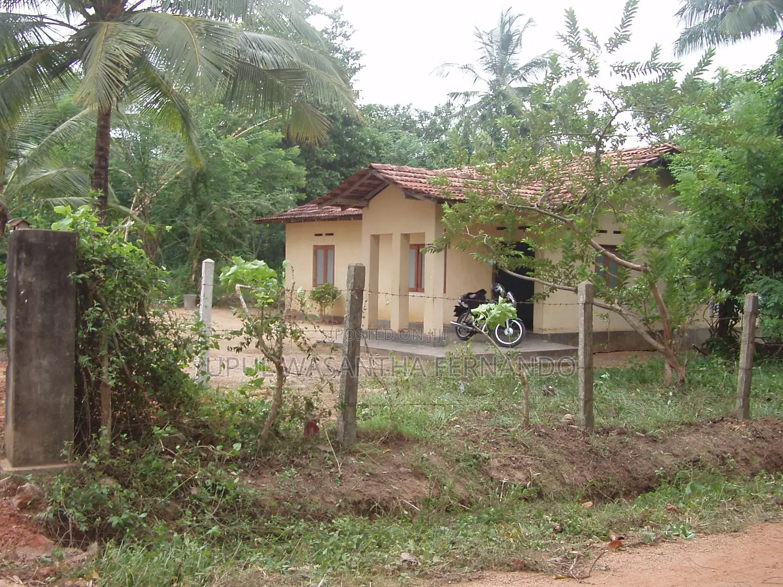Land With a House for Sale