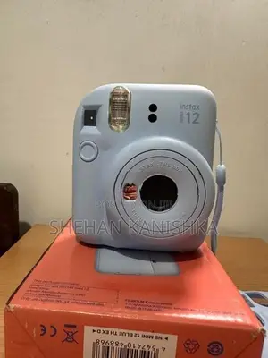 Fujifilm Instax Mini 12 Instant Film Camera (Pastel Blue)