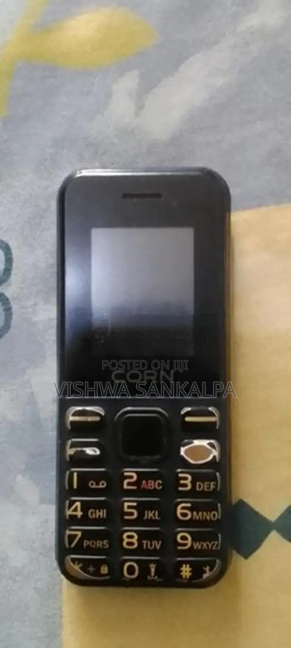Corn Button Phone (Used)