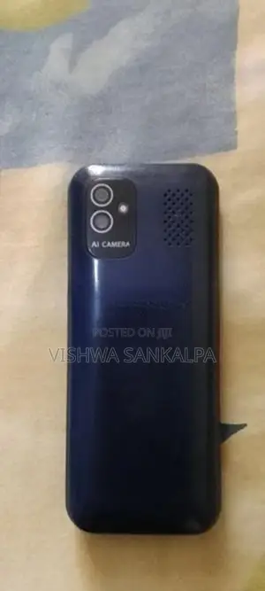 Corn Button Phone (Used)