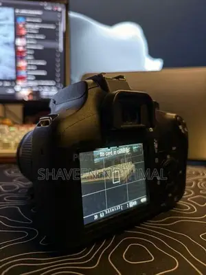 Canon EOS 3000D with 18-55mm lens