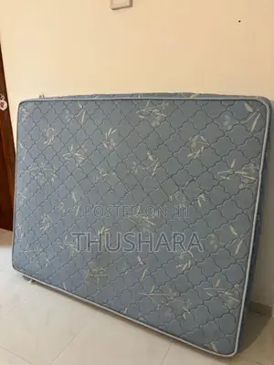 Used Damro Queen size bed with Spring mattress for sale
