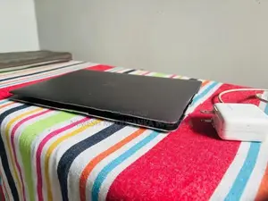 Silver coloured apple Mac book air M1 for sale