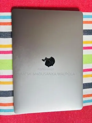 Silver coloured apple Mac book air M1 for sale