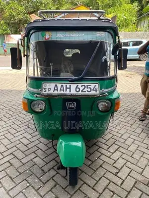 Bajaj RE 2013