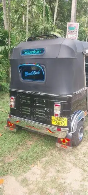 Bajaj RE 205 2013