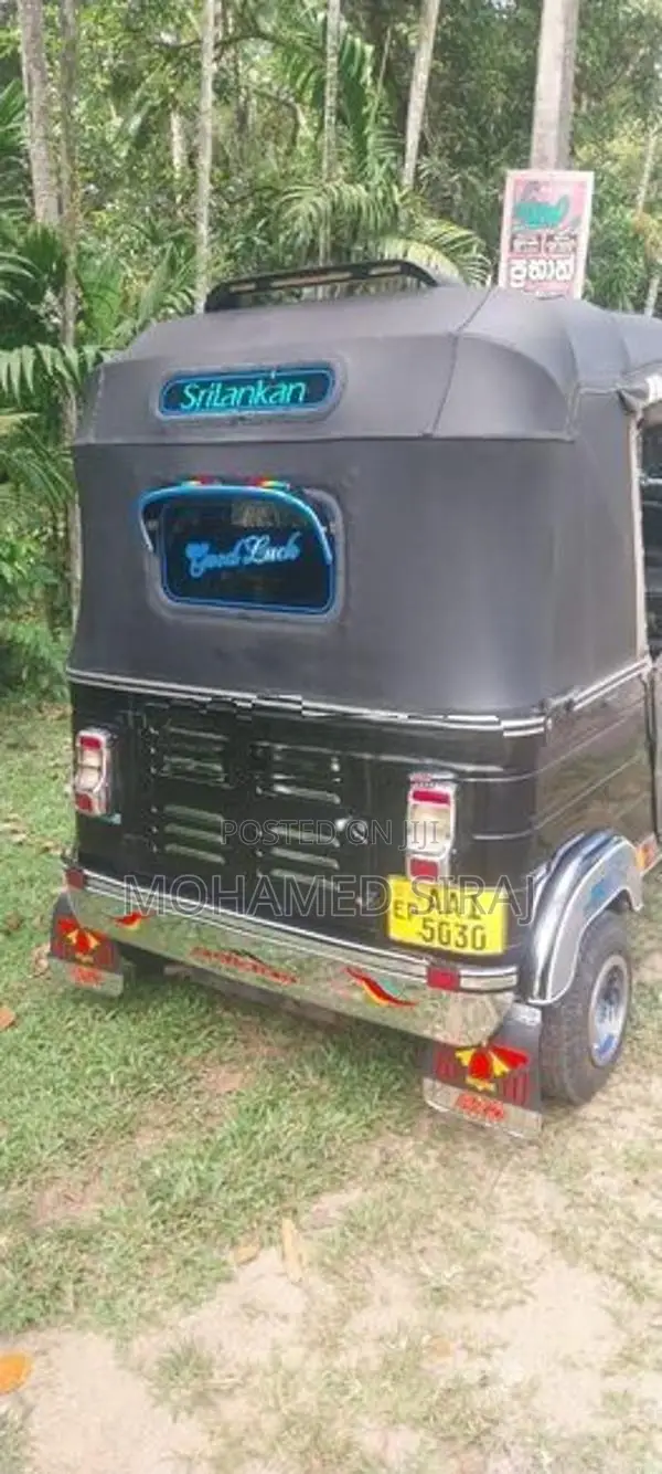 Bajaj RE 205 2013